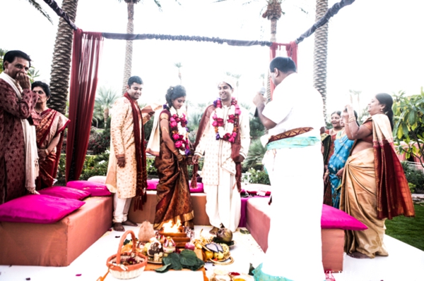 indian wedding ceremony bride groom outdoors mandap