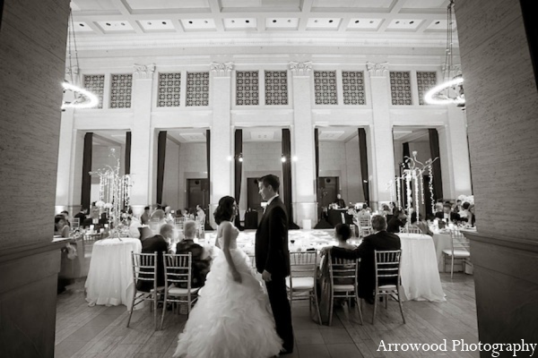 The Indian bride wears a white ball gown for portraits and the reception.