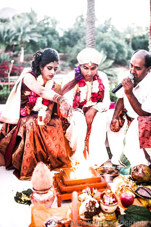 Traditional fire ceremony under the mandap.