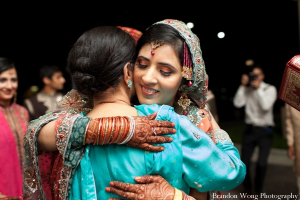 indian-wedding-pakistani-bride-embrace-reception