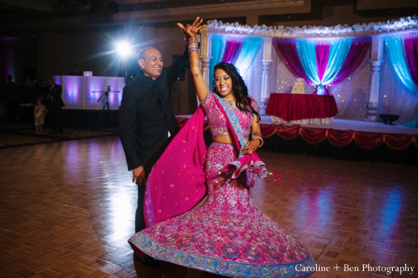 indian wedding reception dancing bride father