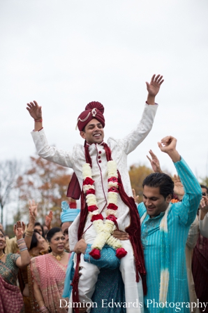 indian wedding baraat groom celebrating jai mala