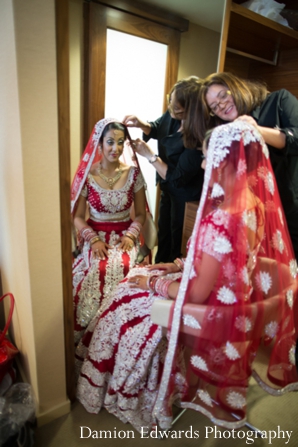 indian wedding bride getting ready traditional lengha