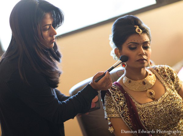 indian wedding bride getting ready makeup