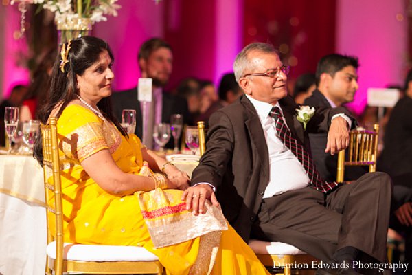 indian wedding reception guests sari yellow