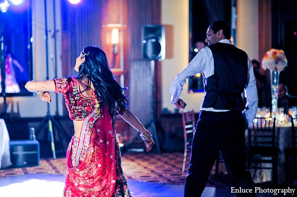 indian wedding reception bride groom dance pink lengha