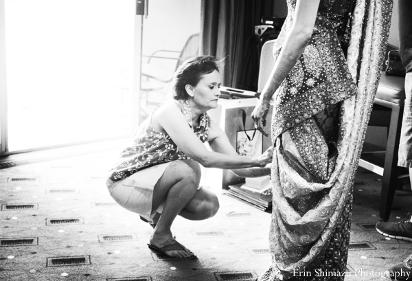 indian wedding bride gets dressed lengha