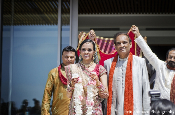 indian wedding bride walks down aisle