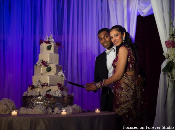 indian wedding bride groom cut cake