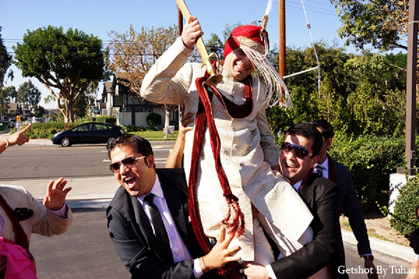 An Indian bride and groom celebrate their pre-wedding festivities before their traditional Sikh ceremony. They then have a quick portrait session with the bridal party and head of to the reception.