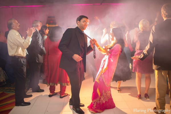 indian wedding bride groom dancing reception