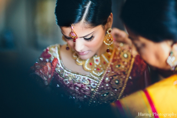 indian wedding bride maharani getting dressed