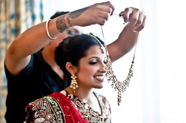 indian wedding bride getting ready jewelry traditional