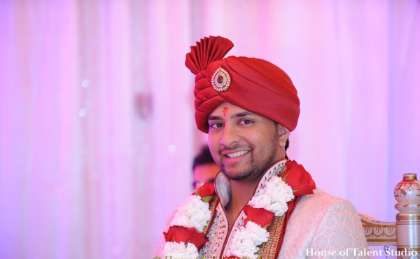 indian wedding groom sherwani jai mala ceremony