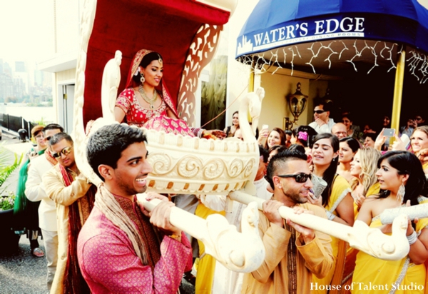 indian-wedding-bride-enters-ceremony-palanquin