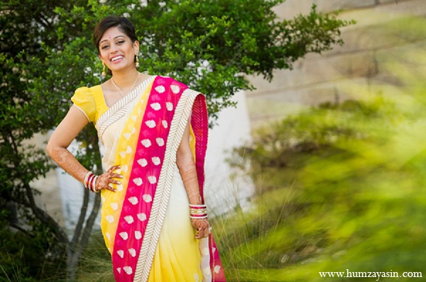 indian wedding bridal pithi outfit yellow sari hot pink