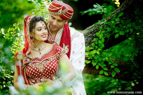indian wedding bride groom portraits red lengha outdoor