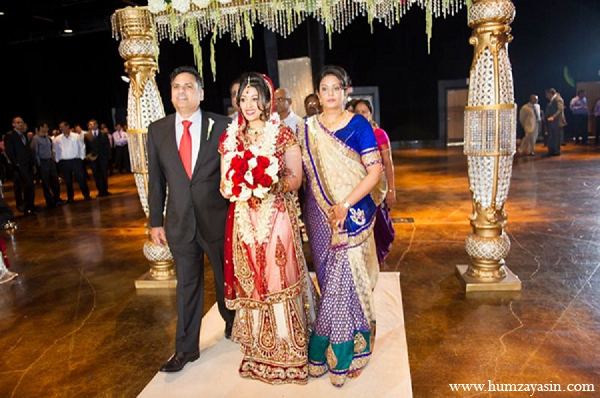 indian wedding ceremony bride family red lengha