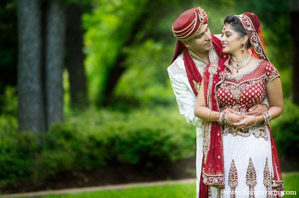 indian wedding portraits bride groom outdoor red white lengha