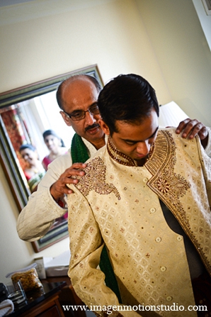 indian wedding getting ready groom father