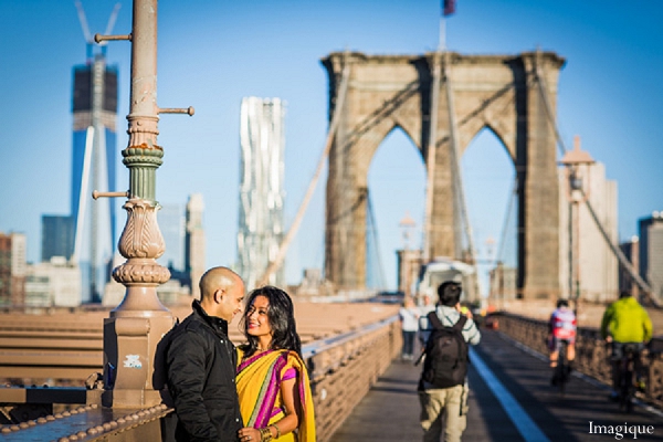 indian wedding engagement session bridge yellow sari