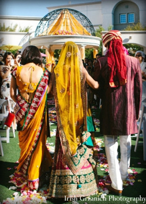 indian wedding bride walking to mandap