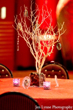 Minimalist modern floral centerpieces are featured at the reception.