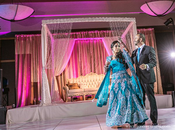 This Indian bride and groom celebrate their Sikh wedding after a family-filled sangeet. They have a traditional ceremony followed by a big reception!