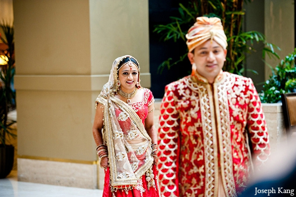 indian wedding bride groom red lengha fashion first look