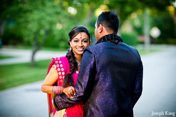 indian wedding portraits garba bride groom outdoor pink lengha