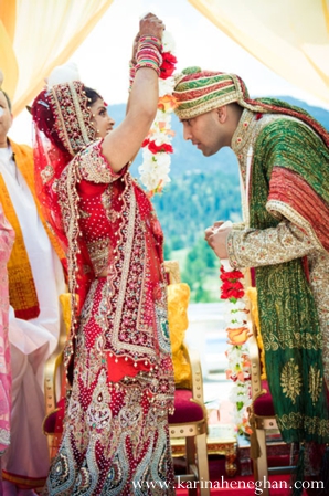 indian-wedding-bride-places-jai-mala-on-groom