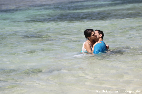 indian-wedding-groom-bride-in-water-kissing-portrait