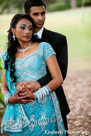 indian wedding reception blue lengha bride groom