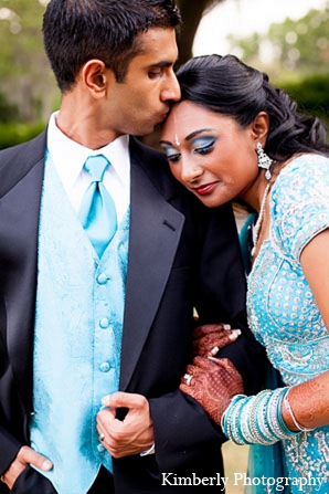 indian wedding reception bride groom blue lengha