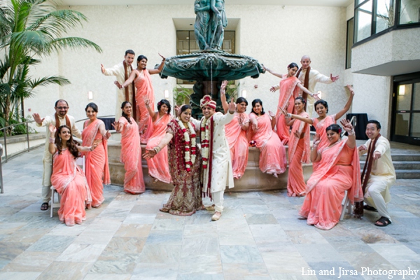 The wedding party poses for portraits following the Indian wedding ceremony.