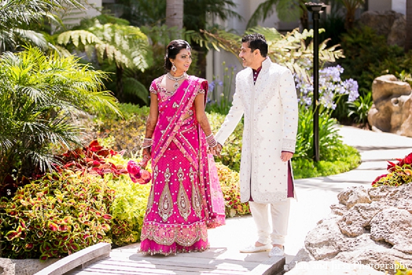 indian wedding groom bride pink sari portraits