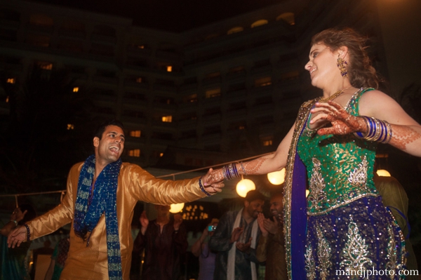 indian wedding mehndi bride groom dancing