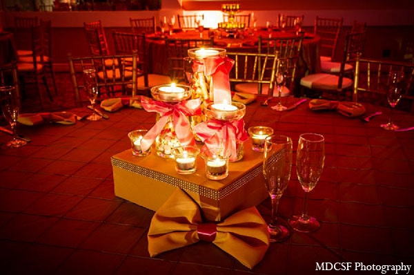 indian wedding reception decor gold table setting candles