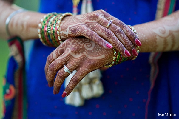 This lovely Punjabi couple takes photos for their Indian wedding. The bridal fashion is traditional yet glamorous.