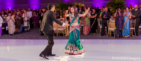 indian wedding bride groom dancing reception