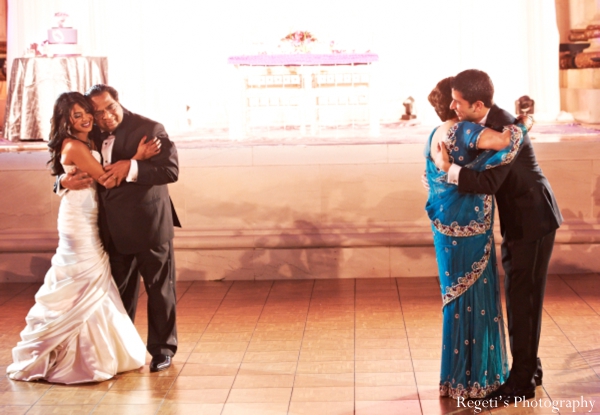 indian wedding reception parents bride groom dancing