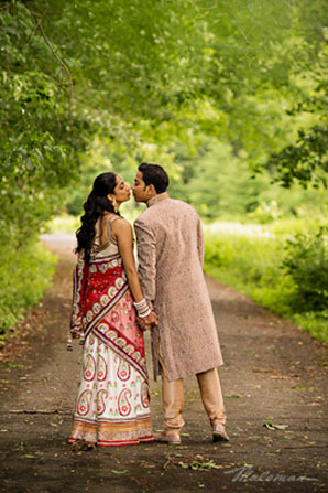 indianweddingbrideandgroomoutsideportraitslenghaandsherwani