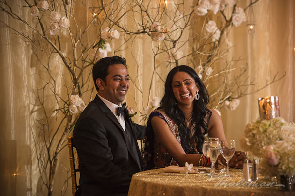 indianweddingbrideandgroomtreeflowerdecorandtablearrangement