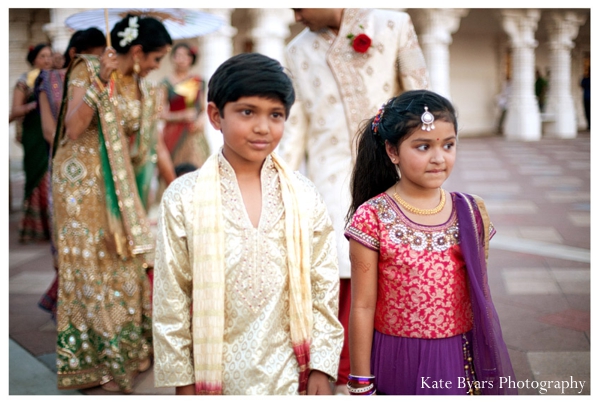 Indian ringbearer and flower girl at an Indian wedding ceremony.