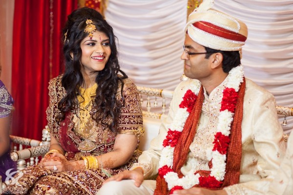 An Indian bride and groom at their traditional Hindu wedding.