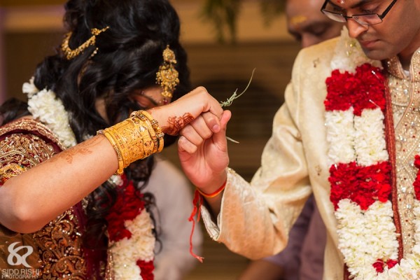 An Indian bride and groom at a Hindu wedding ceremony in Sydney, Australia.