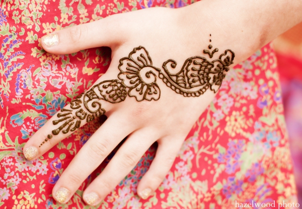 Bridal mehndi done at an pre Indian wedding ceremony.