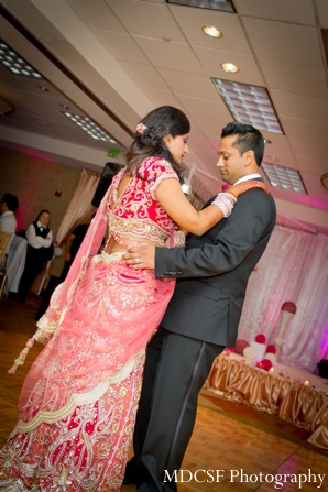 Indian wedding reception in pink theme.