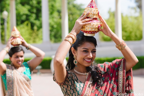 Indian bridesmaids wear wedding saris.