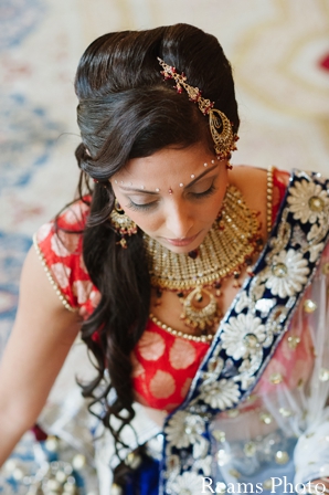 Indian bride chooses fashionable bridal lengha for indian wedding ceremony.